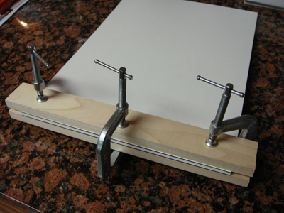 Paper, Covers and Boards Clamped Together